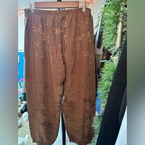 Brown flowy pants.